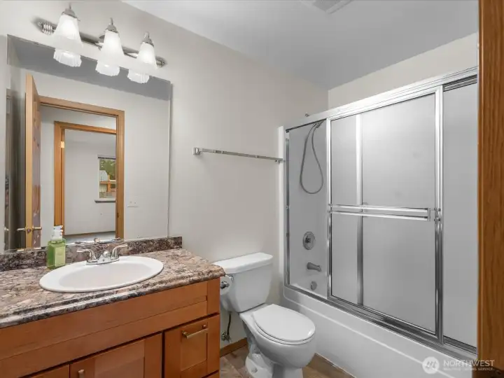 Full guest bath off hallway