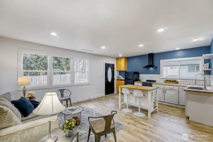 Sunlight fill the modernized DADU with natural light. Views of the private, fully fenced back yard.  kitchen with lots of storage including a coffee bar in the corner. New mini-split for heat & AC. 3/4 bath