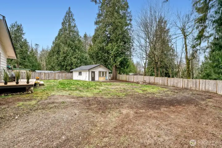 The expansive, fully fenced yard offers exceptional privacy, framed by mature trees and generous garden space perfect for growing, relaxing, or entertaining. Secure, fenced RV & boat parking provides rare convenience & peace of mind.