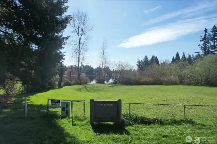 Discover refined Northwest living in the highly sought-after Lake Kathleen community, where privacy, natural beauty, and neighborhood prestige come together.