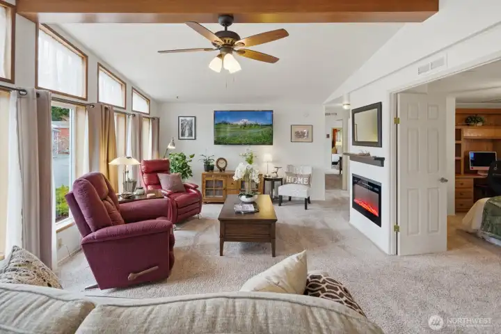 Enter to the vaulted ceilings and large view windows that create a bright & airy atmosphere that showcases all this home has to offer.