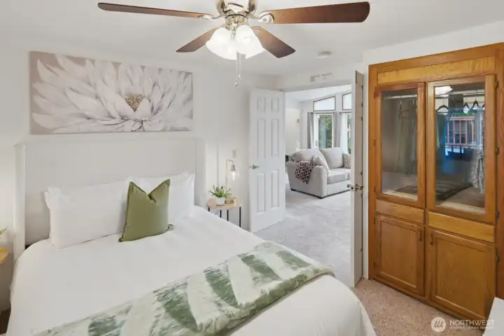 First of 2 guest bedrooms with double-door entry, built in armoire, and built-in desk area. This room would also make a perfect office or hobby room.