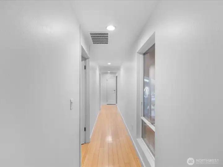 Hall upstairs. Notice the bamboo floors. Freshly painted. (all bedrooms are conveniently located upstairs)