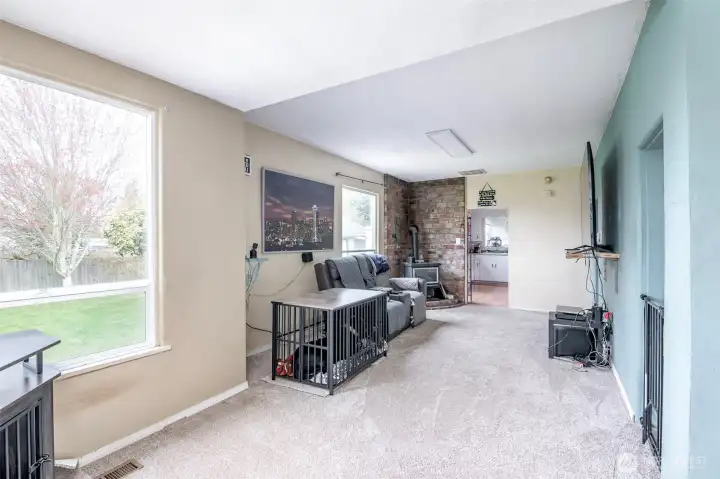 Full view of living room. Brand new carpet.