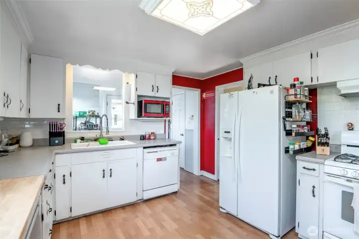 Laundry room straight ahead, dining room and pantry to the right.