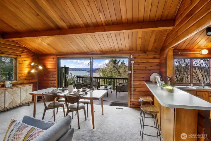 Enjoy spectacular sunsets from the dining room, which features an oversized sliding glass door offering views of Lake Washington