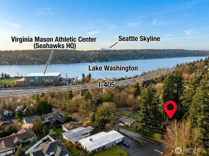 Open concept great room, dining, and kitchen with stunning lake view