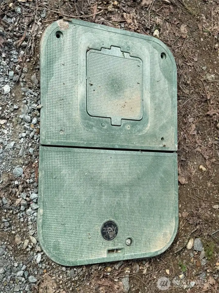 Water at top of drive at road