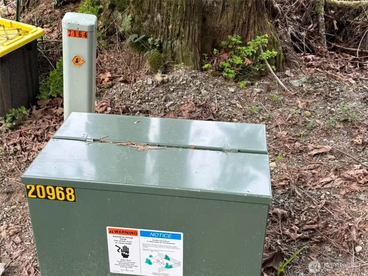 Power and phone at top of drive at road