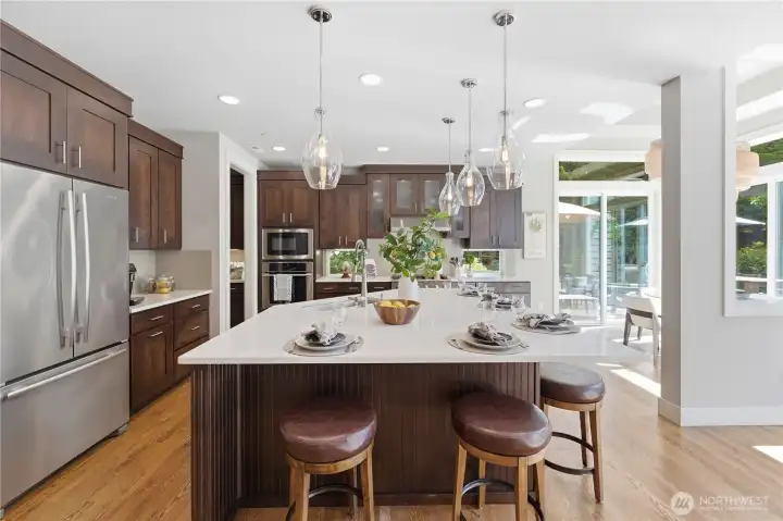 Designed for gatherings, the open layout allows effortless movement between the family room, kitchen, and breakfast nook