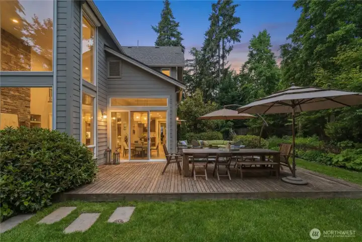 At dusk, the cedar deck becomes a calm, inviting retreat — another beautiful view of this outdoor space.