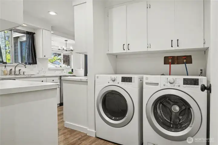 Conveniently situated just off the kitchen, the laundry area includes a washer and dryer.