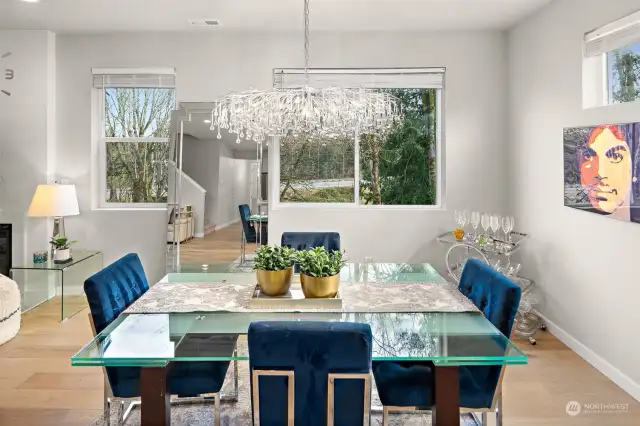 Spacious dining area with designer chandelier