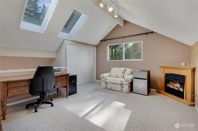 Primary Lofted Bedroom with 3/4 Bathroom.