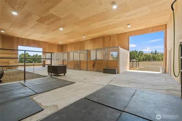Indoor wash rack w/tack room to your right and hay storage to your left.