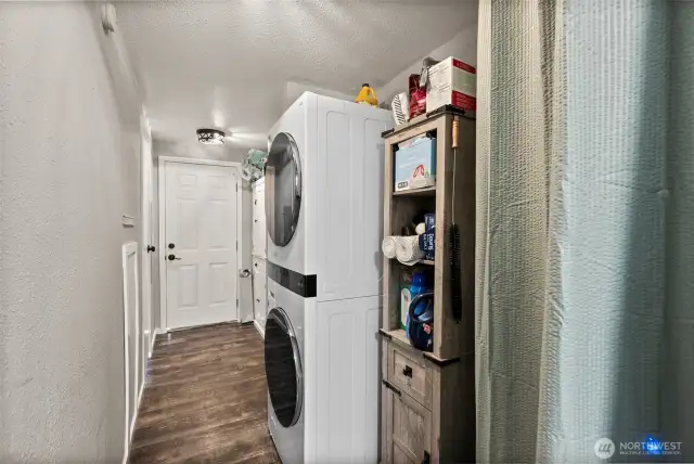 This Utility Room has Space Galore! New Furnace, W&D Hook-ups, & Door Accessing Private Bcakyard!