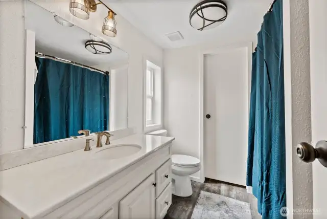 Full Primary Bath! Updated Fixtures. Easy Care Floors!