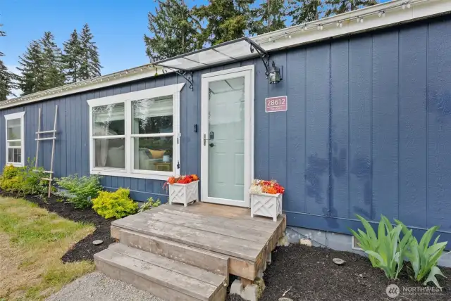 Glass Screened Front Door and Landscaped Yard