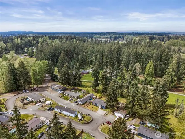 Still Water is Found Tucked Down a Paved Entrance into the Quaint Community of 16 Homes Situated in a Cul-de-Sac Loop.