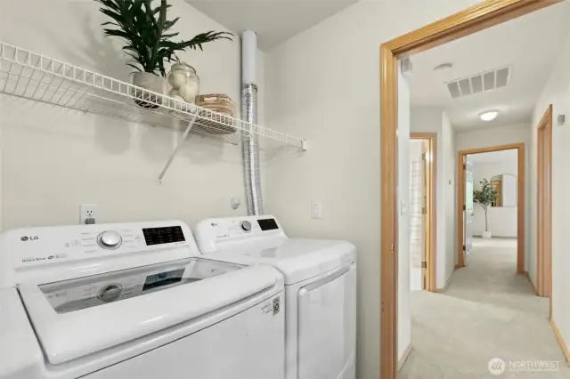Newer washer & dryer in the utility room off the garage.