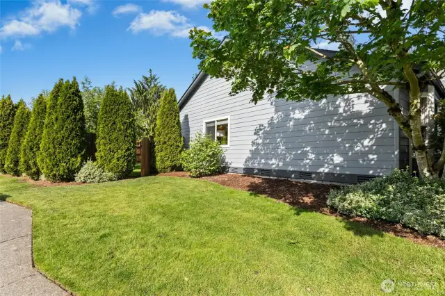 This home is on a corner lot in a cul-de-sac. This is a view of the left side of the home.