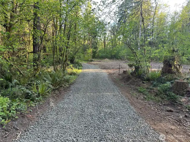 Private drive leads to your already cleared building site.