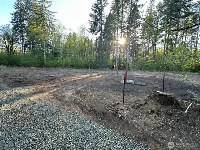 Building site has been cleared. Power has been brought onto property.