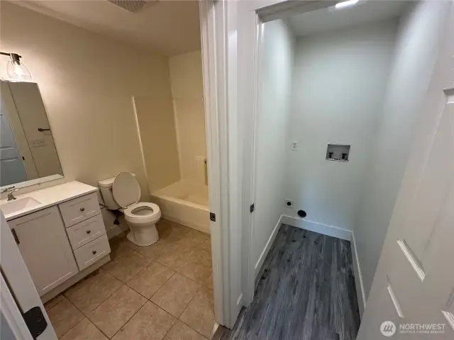 Laundry space and bathroom