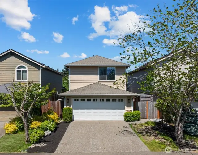 2-car garage with driveway parking