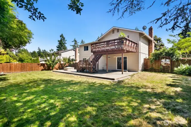 Spacious level yard at rear of home