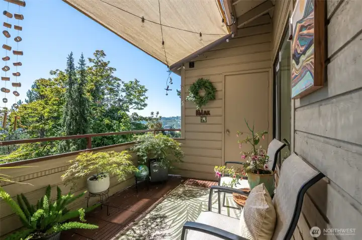 Relax on your private back deck and take in the beautiful scenery! You'll also find a storage closet here as well.