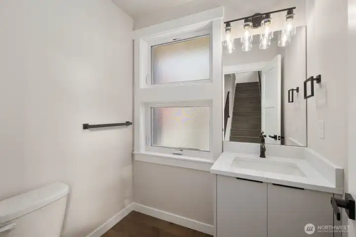 Conveniently positioned powder room.