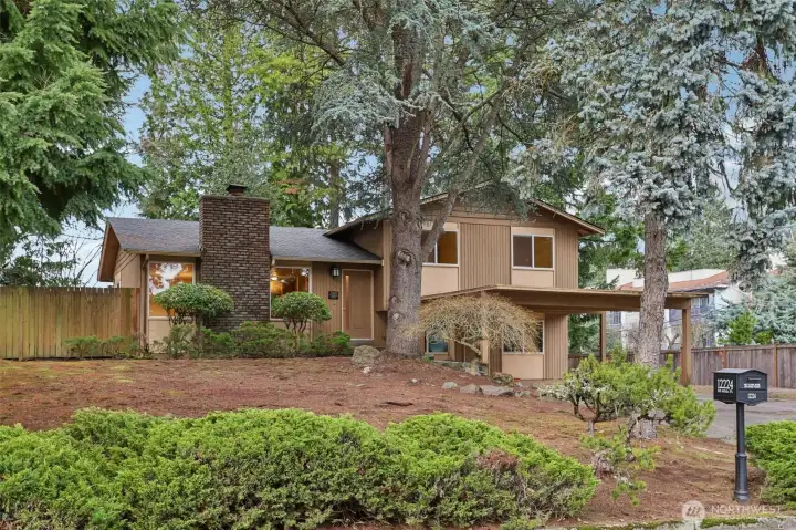 Tree-lined streets and pride of ownership define this Newport Hills setting.