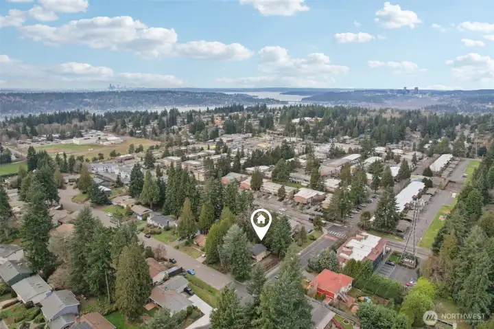 Generous corner lot with future potential under Bellevue zoning -buyer to verify