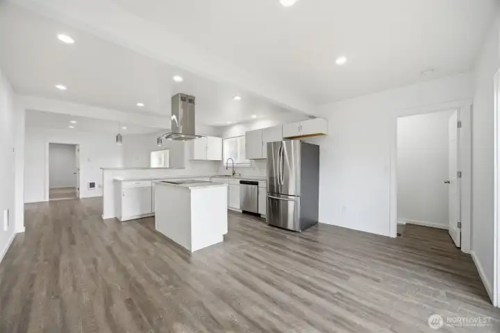 Natural lighting and open concept space makes this area feel extra large.