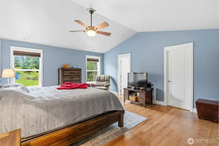 Luxurious Primary Retreat  Spacious 5-piece primary suite featuring a soaking tub, oversized closet, and tranquil private views overlooking the protected forest.