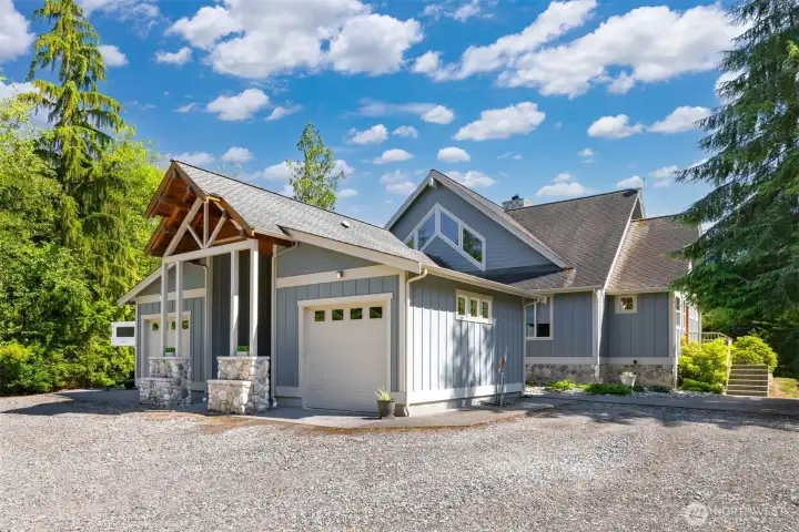 There are two separate garages and a well-defined covered front entry.