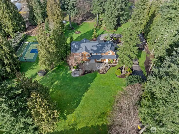Aerial view of much of the yard. Nearly 3 acres of idyllic beauty!