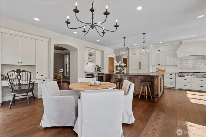 The informal dining area has a built-in desk/work station.