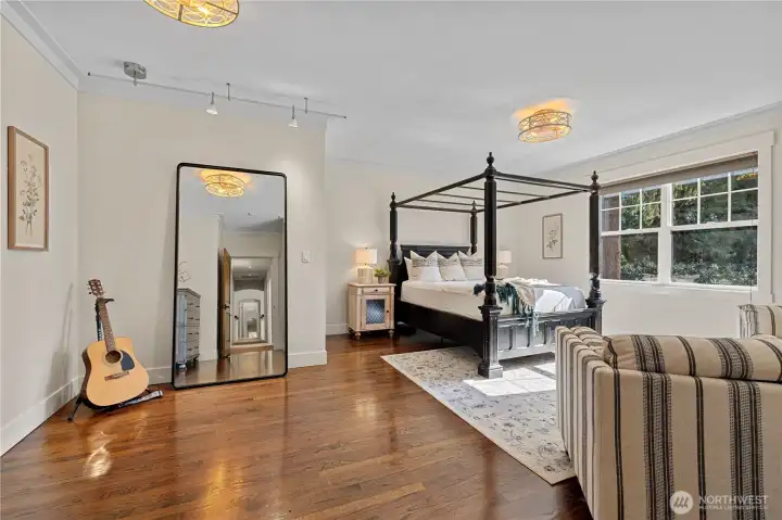 Primary bedroom #2 has a walk-in closet with built-in cabinetry and north facing views.