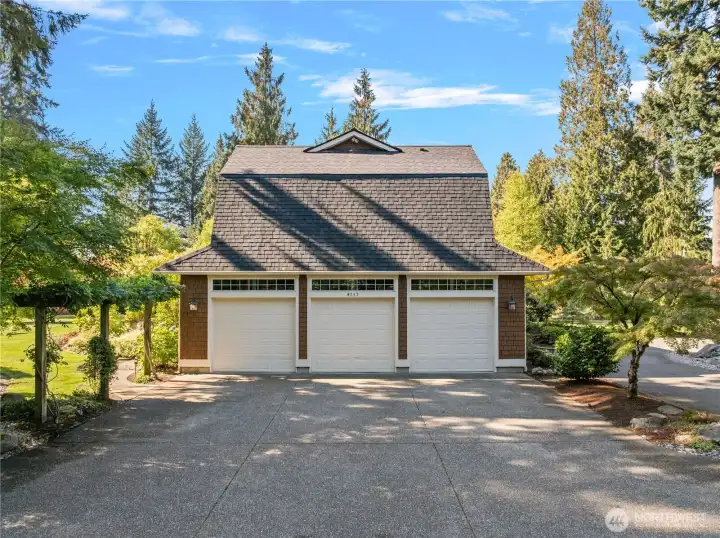3 car garage. There is also a 2 car carport with an attached storage building.