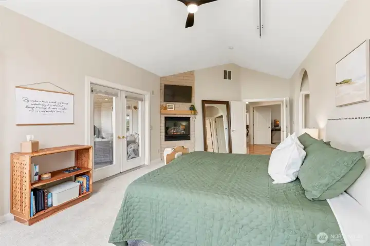 Primary suite with gas fireplace. Primary suite with gas fireplace.