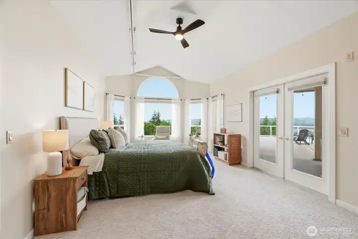Primary suite with deck access. Primary suite with deck access.