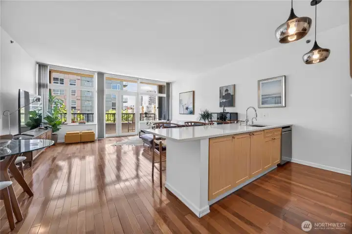 The windows that go the length of the condo and high ceilings make it feel even bigger.