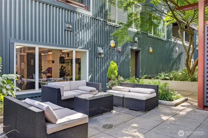 Outdoor patio for all residents includes outdoor furniture and a BBQ too.