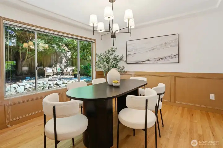Formal dining room showcases hardwood floors. Formal dining room showcases hardwood floors.