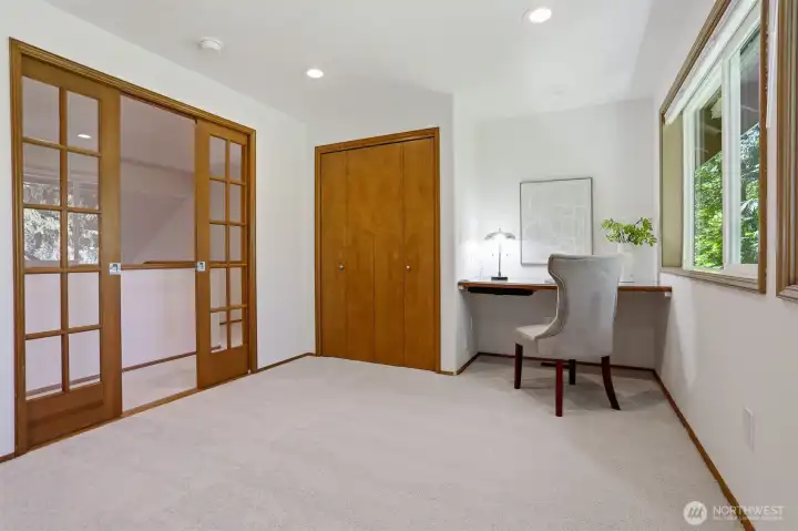 Upper level bonus room has closet, built in desk, & sliding French doors. Upper level bonus room has closet, built in desk, & sliding French doors.
