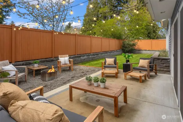 Fully fenced sunny back yard makes entertaining and safety a breeze!