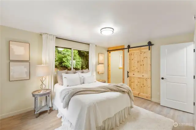 Peaceful primary bedroom and bathroom