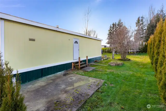 Patio off of laundry/utility and kitchen